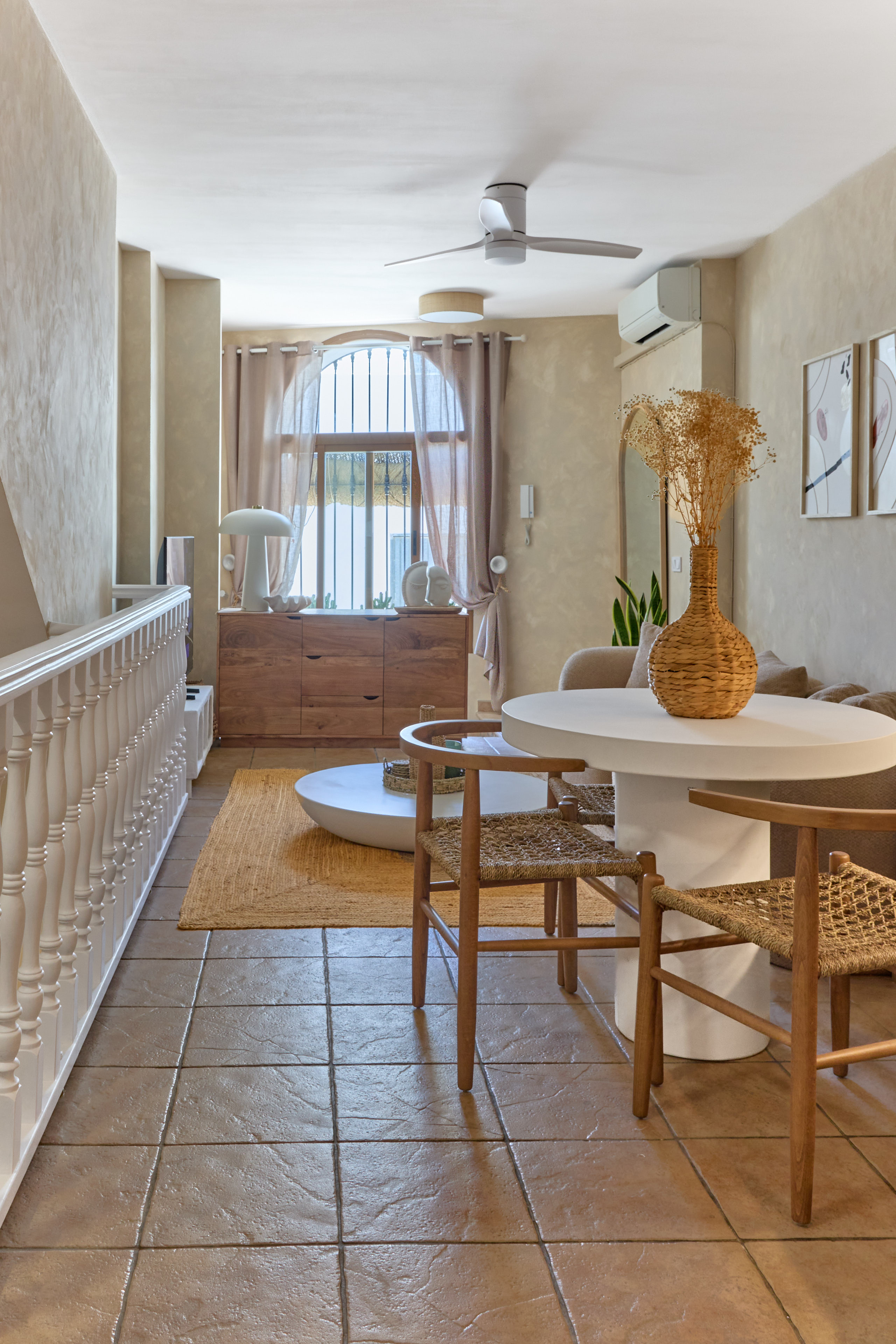 Bright neutral living room at Casa Wanda with natural textures