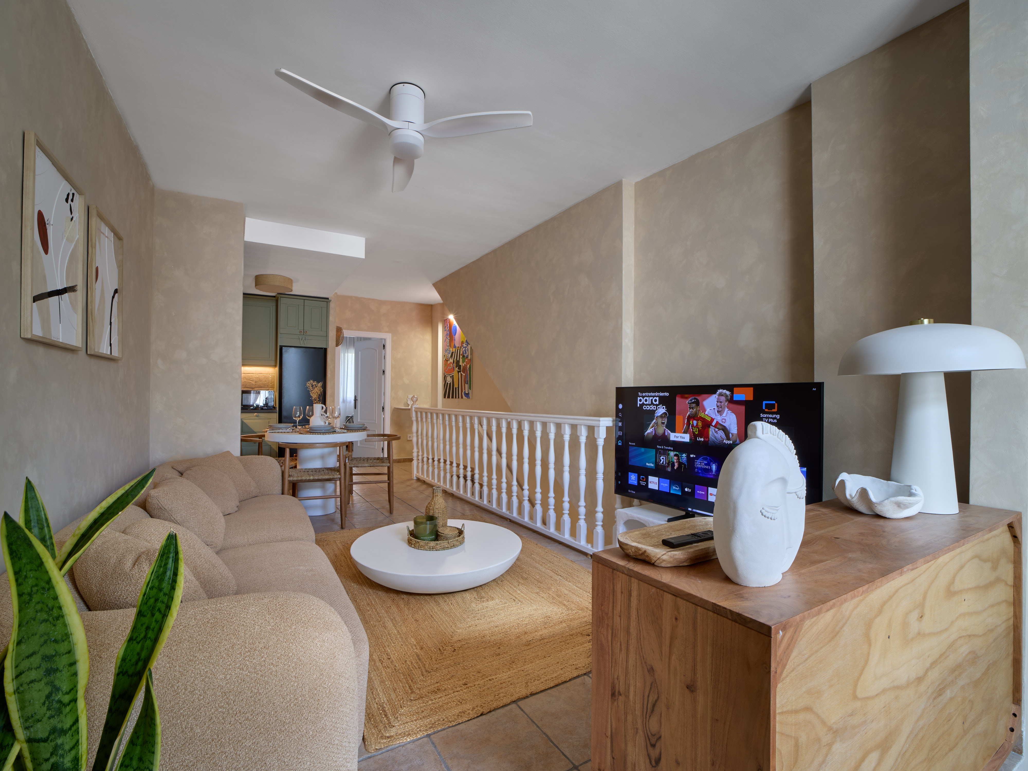 Bright neutral living room at Casa Wanda with natural textures