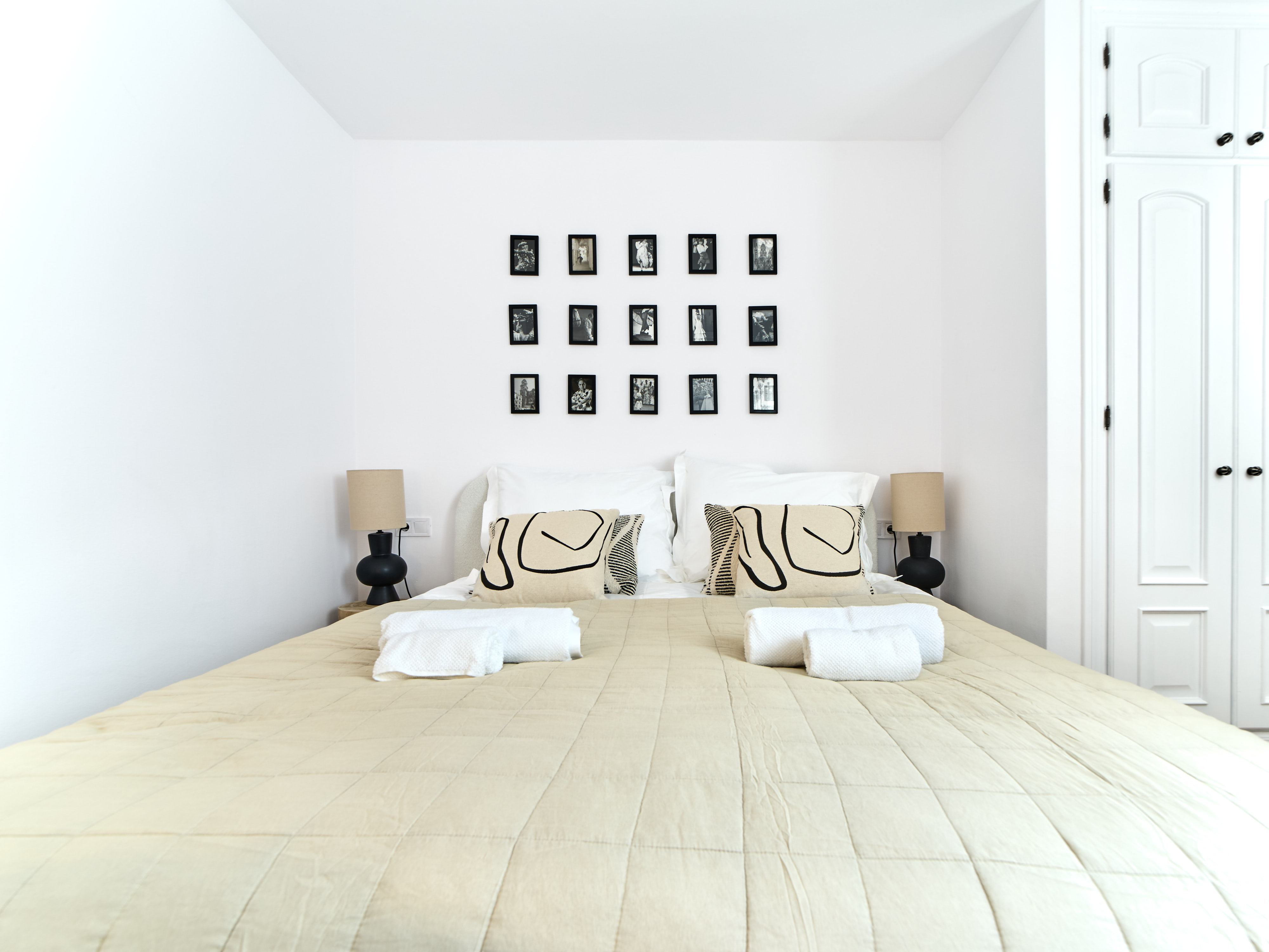 Calm Casa Wanda bedroom with soft neutral bedding